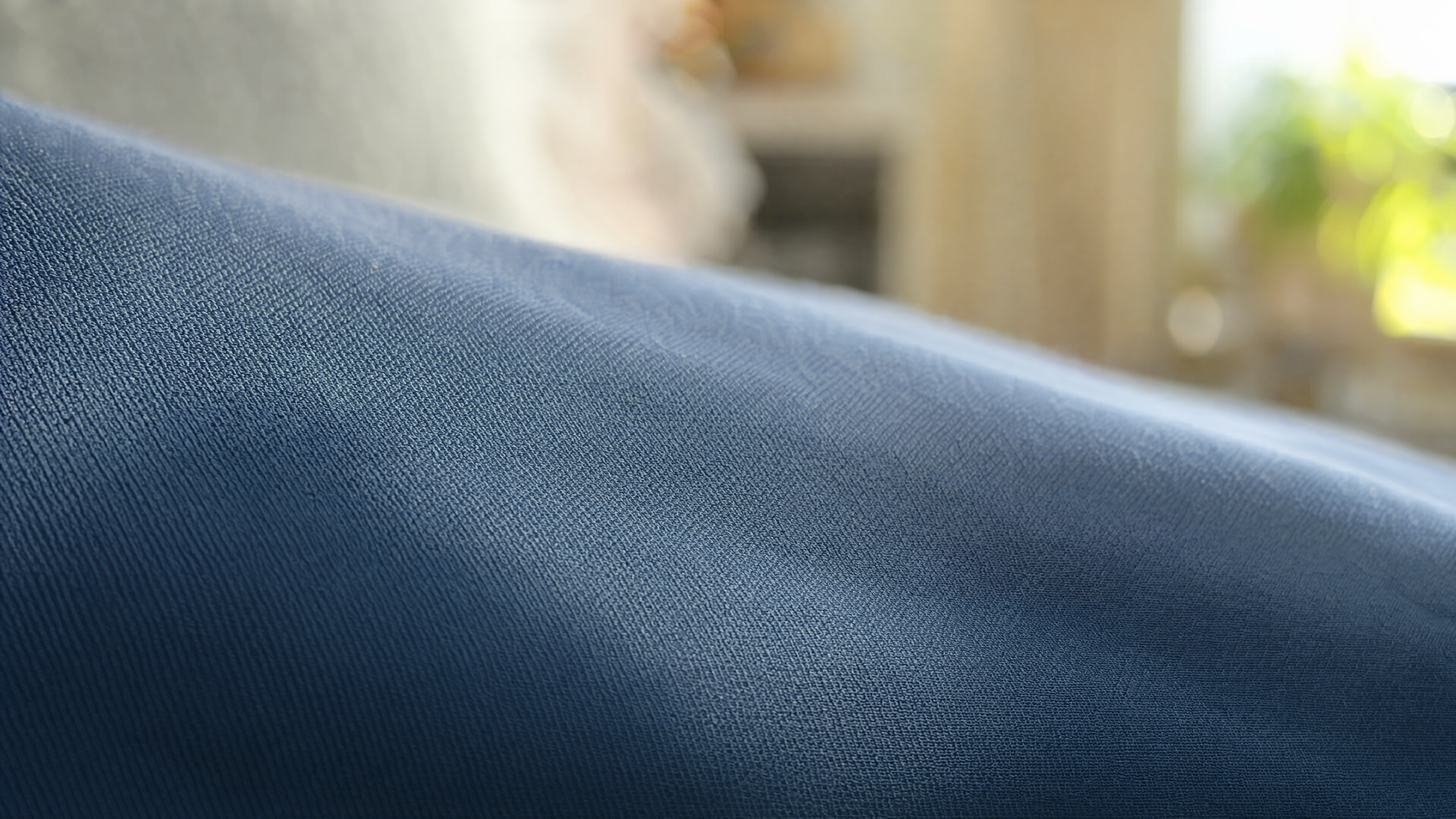 Buttery-soft double-brushed microfiber sheet fabric texture close-up avoiding common sheet buying mistakes