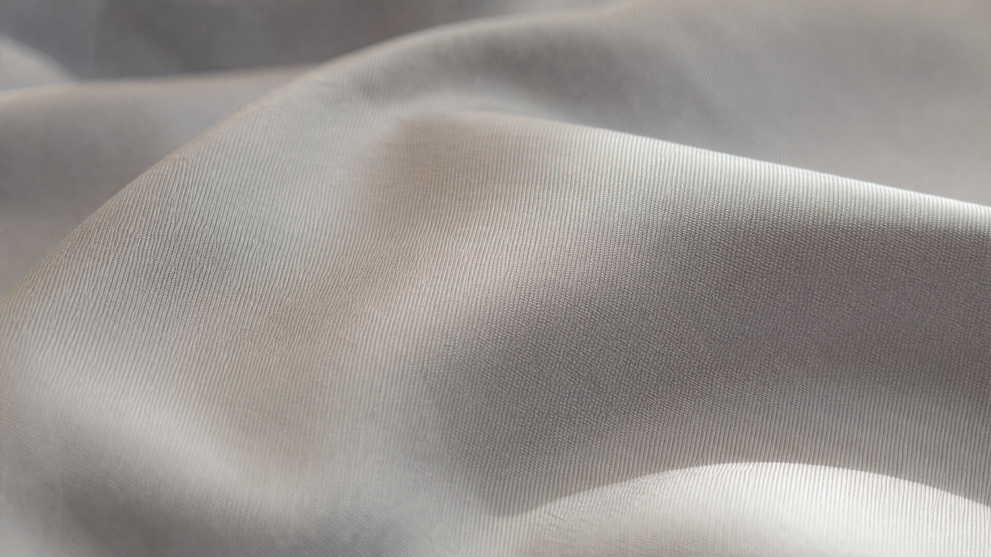 Buttery-soft double-brushed microfiber fabric texture ideal for back sleepers