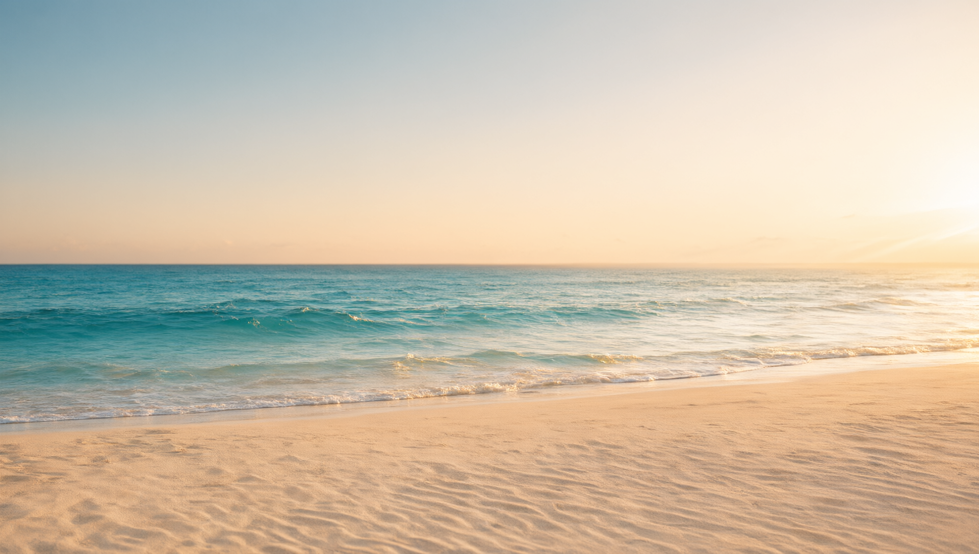 Warm golden-hour beach and ocean photograph